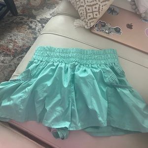 turquoise free people movement shorts 👏